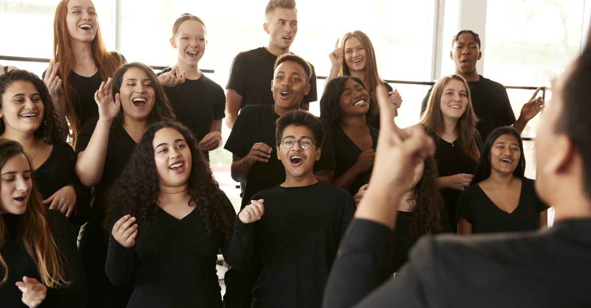 Youth choir singing happily