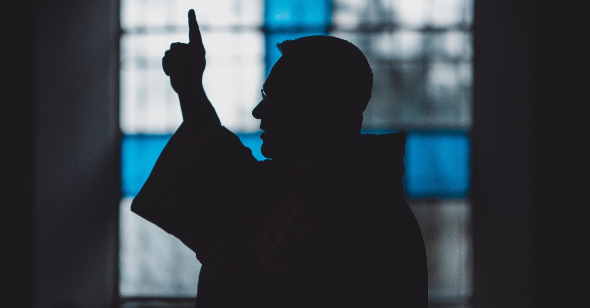 Silhouette of a pastor giving a sermon