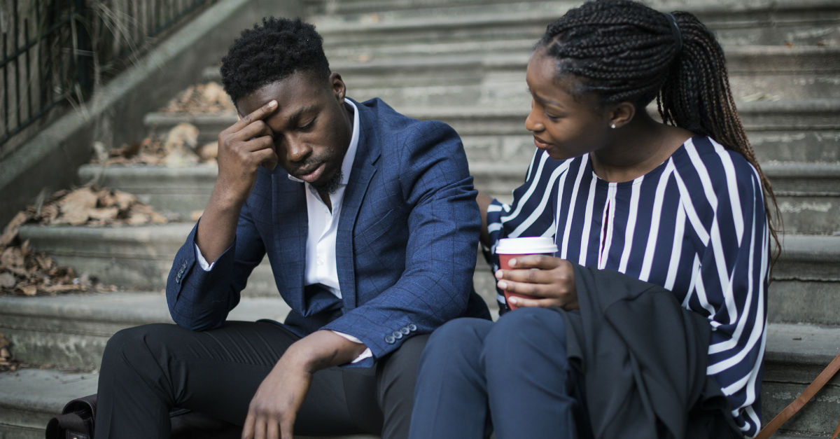 woman consoling man who is sad God Sees Whats Done in the Dark