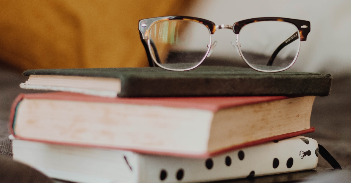 Glasses on a stack of books, the lord is my light and my salvation