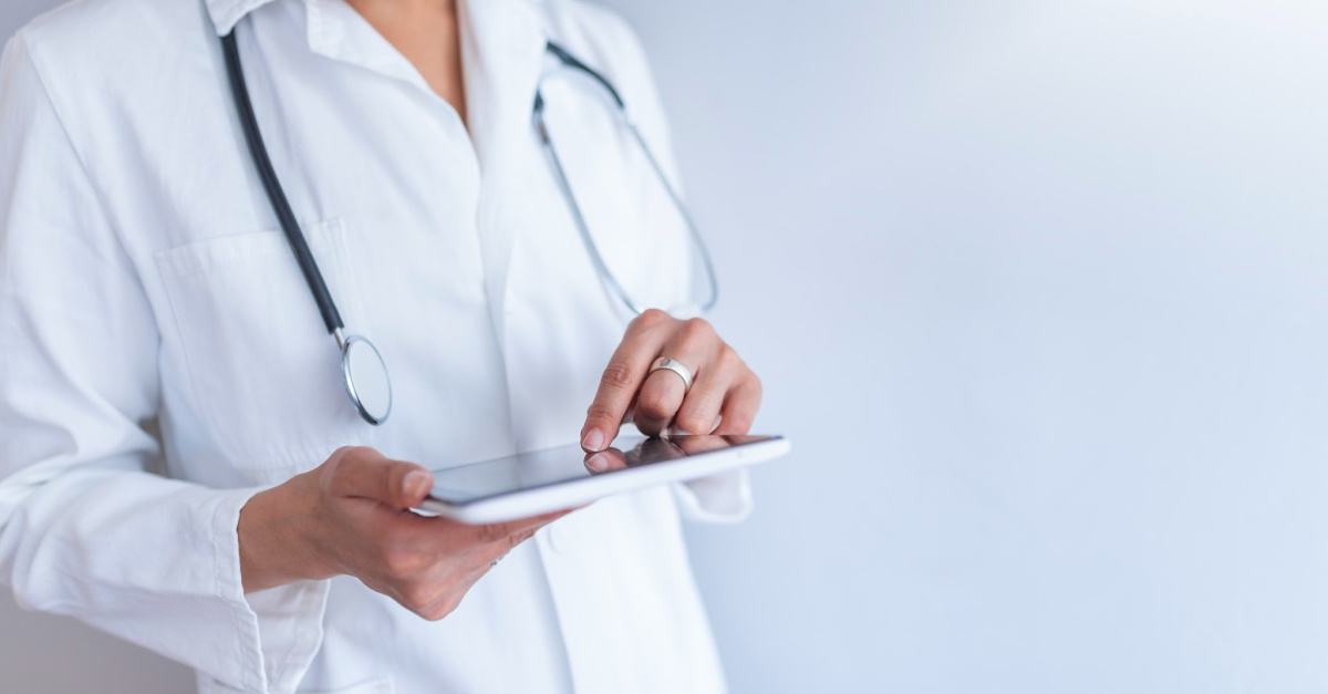 Doctor working on a tablet