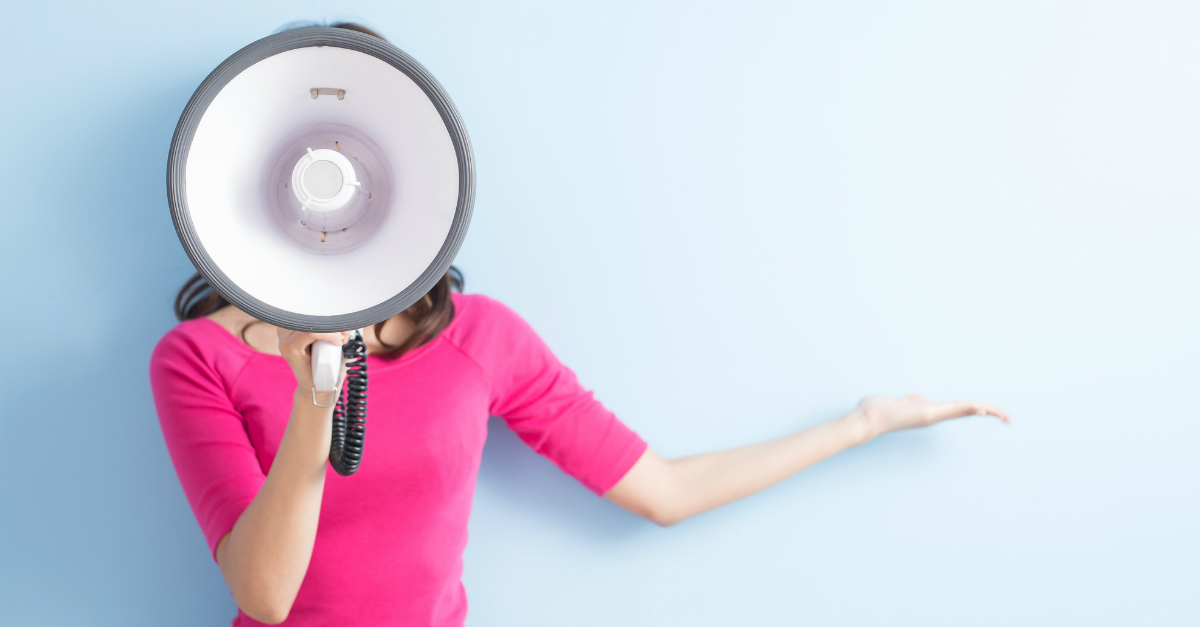 Woman talking into megaphone