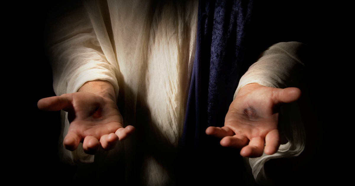 jesus hands pierced to illustrate seventh-day adventist beliefs about jesus