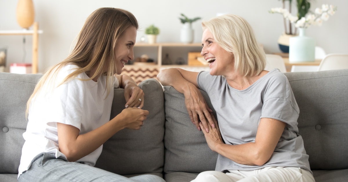 Two women talking and laughing