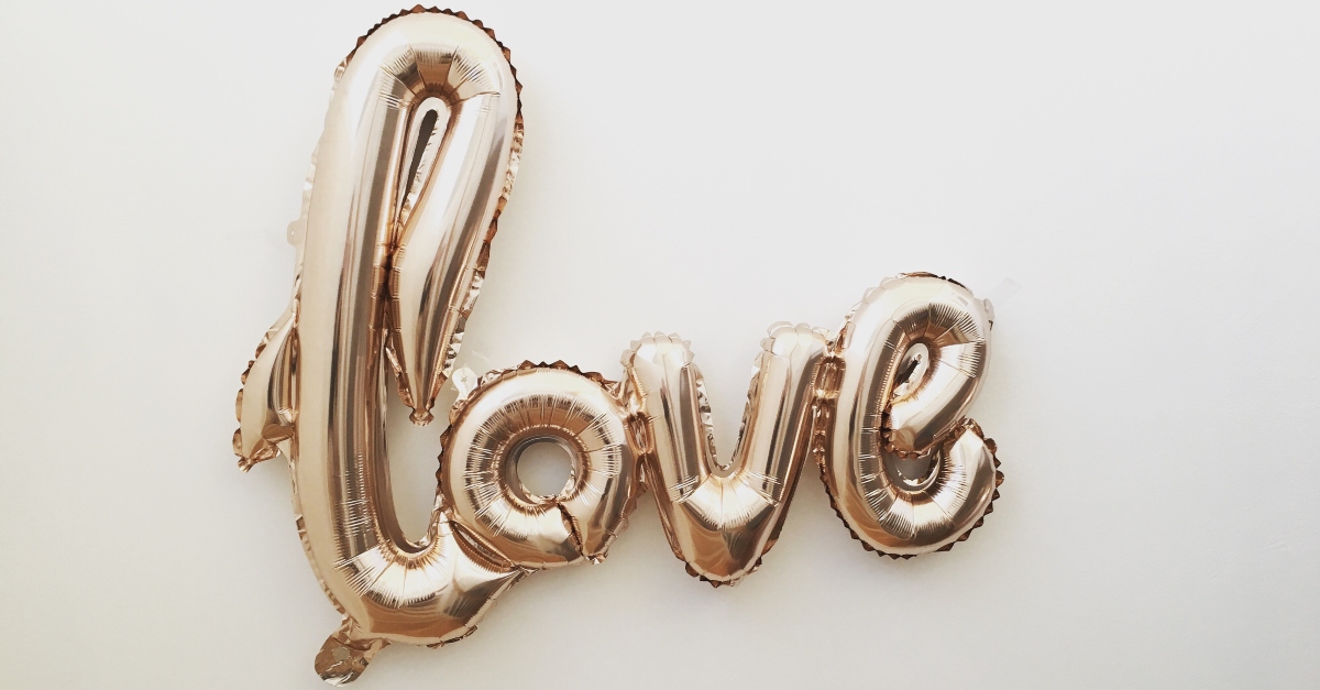 gold balloons spelling out love