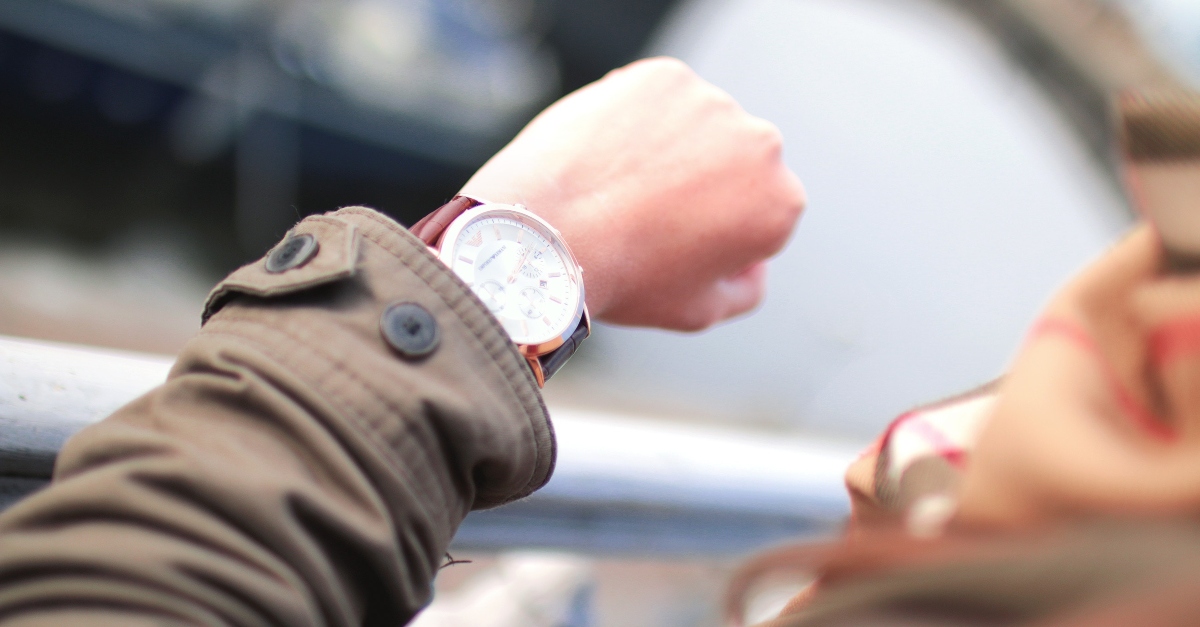 woman looking at watch, how satan uses scripture against you