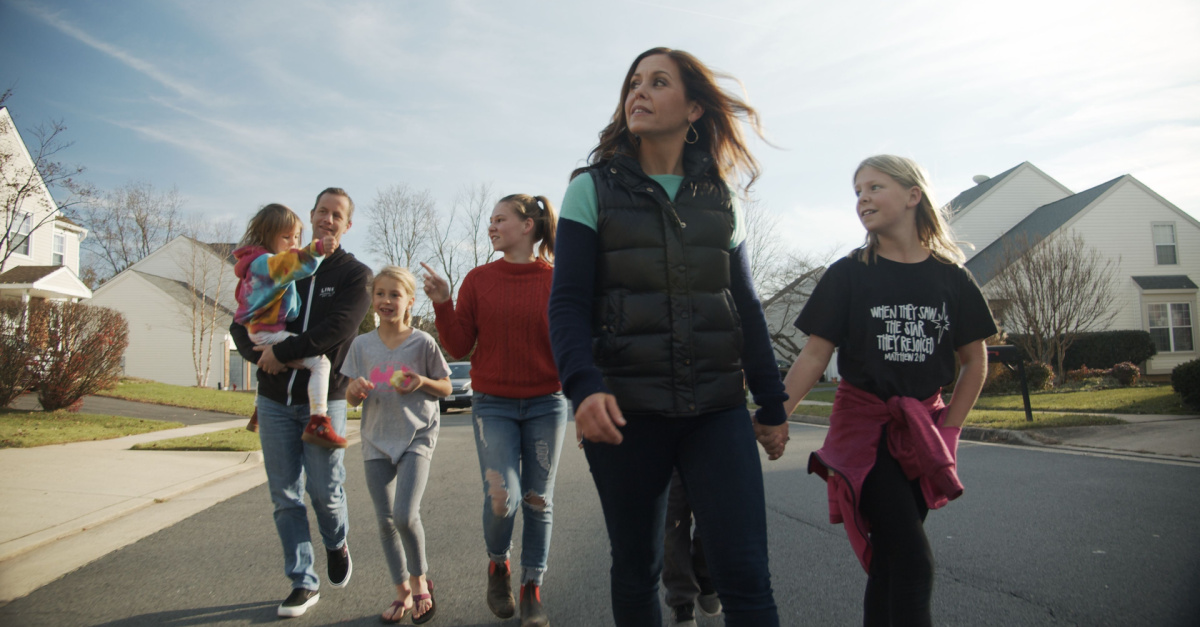 Kirk Cameron and his family walking down the street