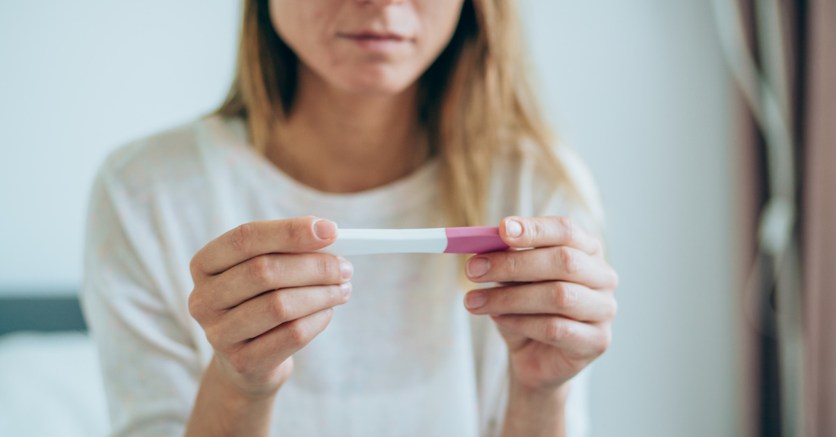 a woman with a pregnancy test, why I am pro-life but dont agree with Roe being overturned