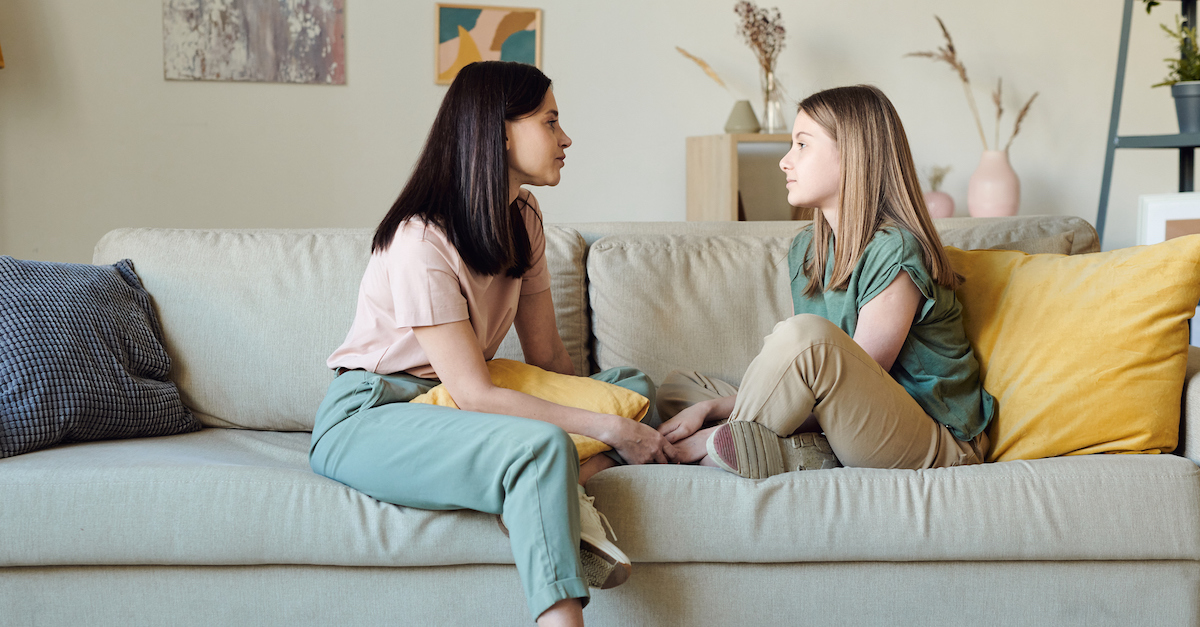 Mom talking to teen daughter