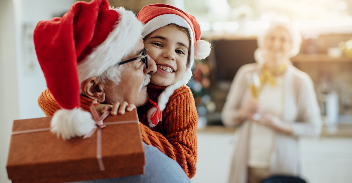 Boy with grandparents on Christmas