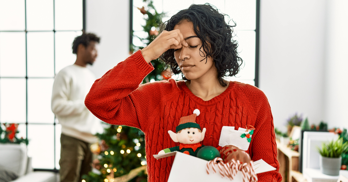 Woman stressed overwhelmed christmas holidays