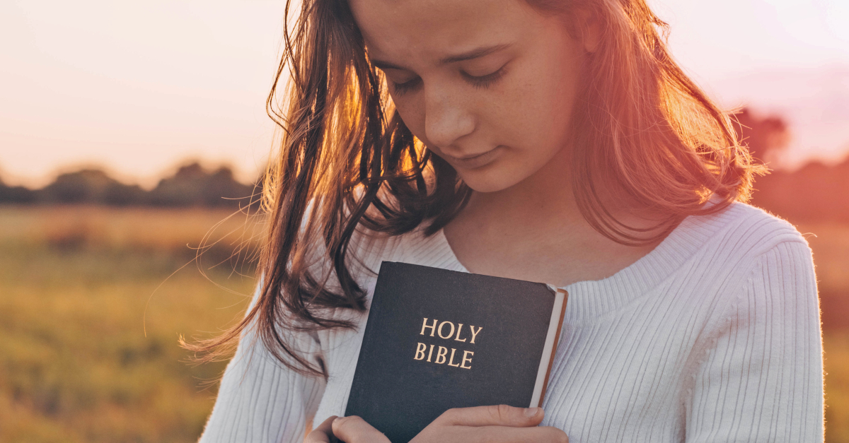 Girl holding a Bible