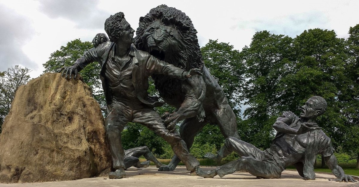 Bronze statue Livingstone and the Lion at the David Livingstone Centre, Blantyre, Scotland.