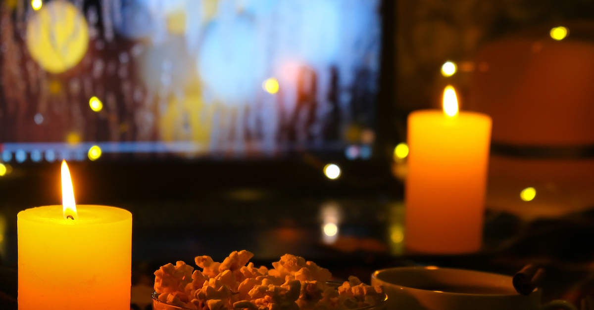 Cozy candles and popcorn for fall movie night