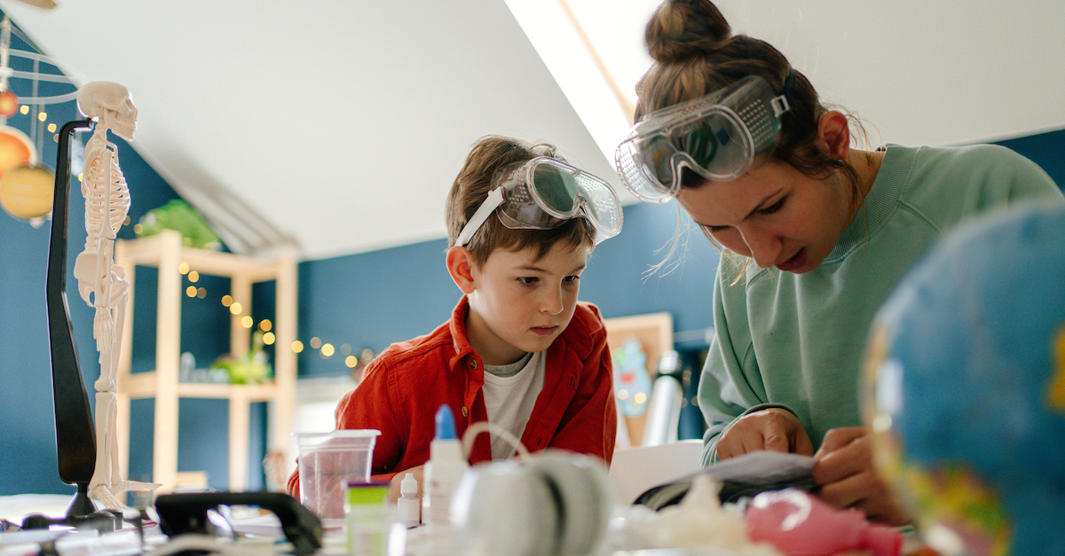Mom homeschooling teaching son science experiment homeschool craft