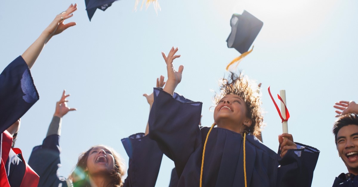 college graduates tossing caps in air, prayer for graduate