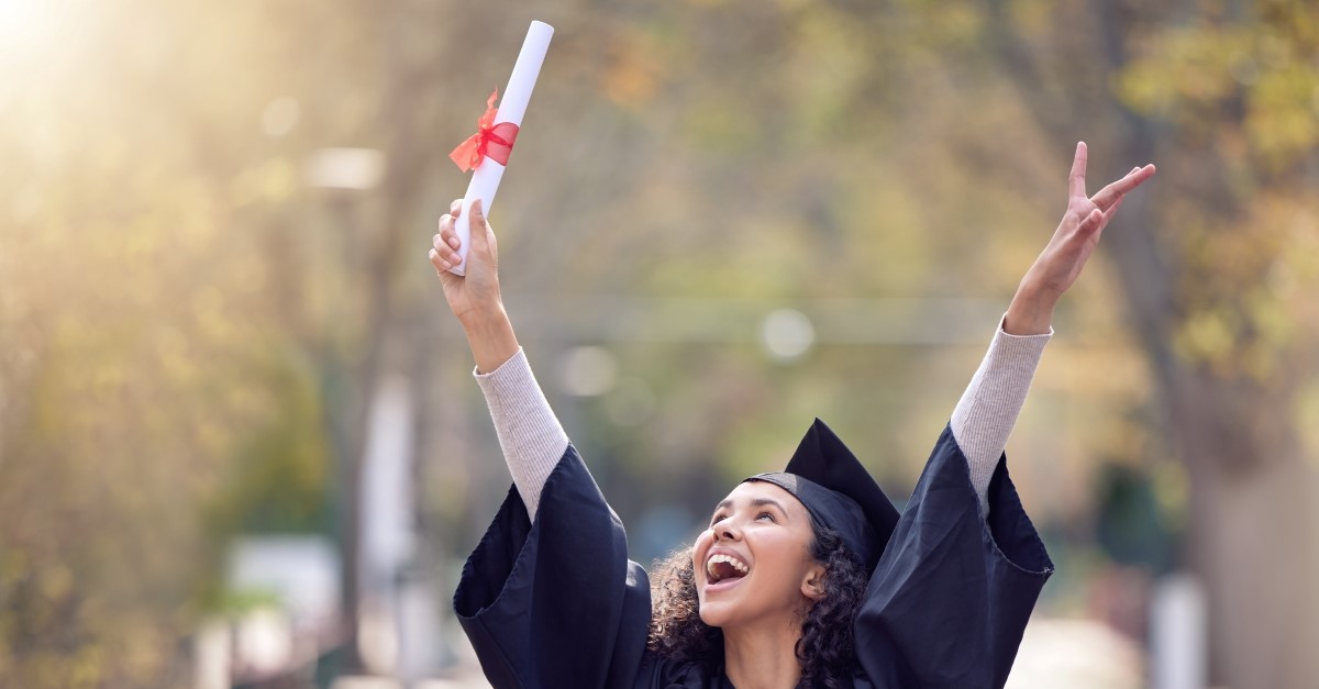 woman cheering on college graduation day, prayer for graduate