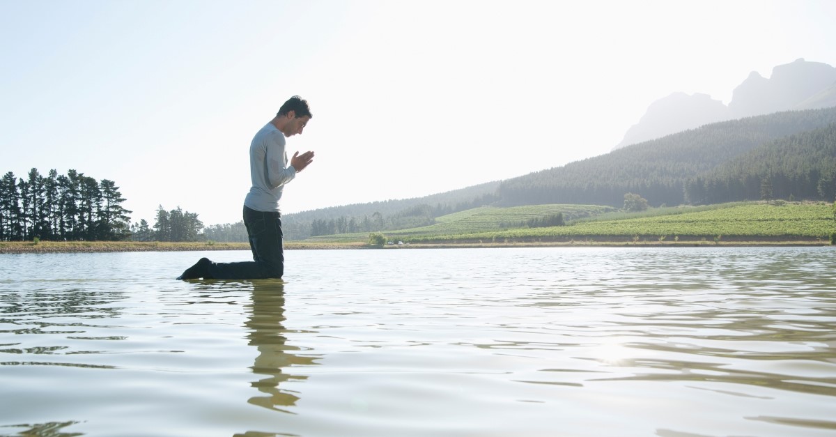 man kneeling by water and praying, do great things for god old age