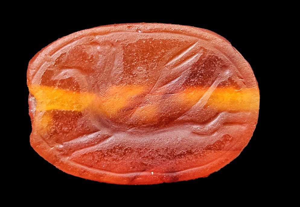 The engraved underside of an ancient scarab-shaped Solomonic seal