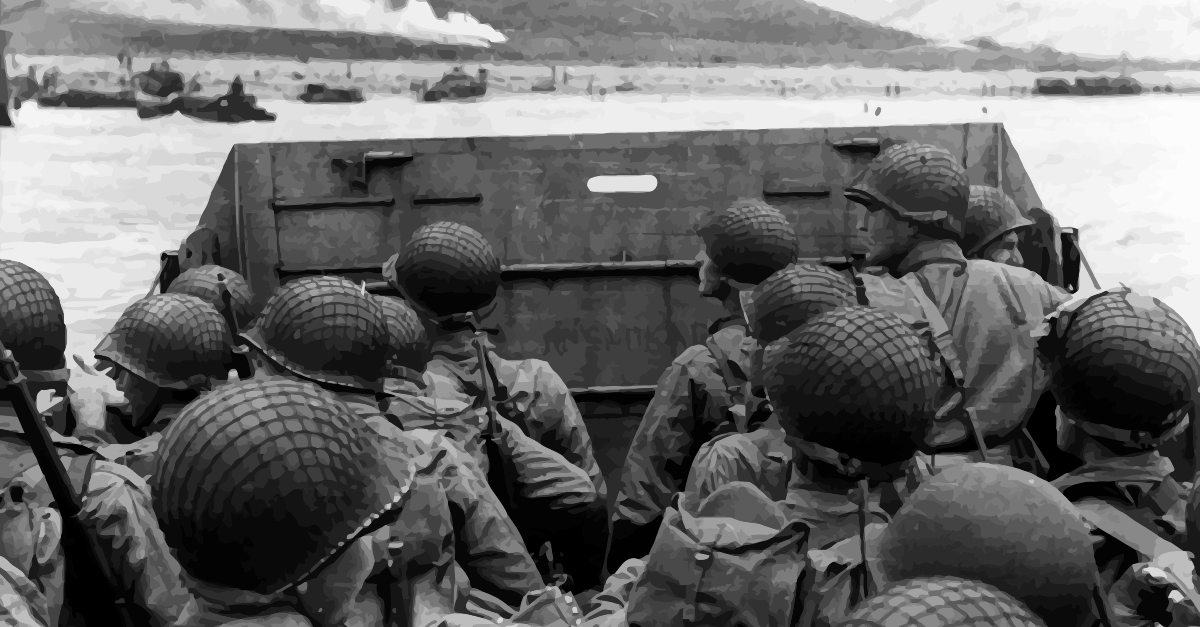 American soldiers on a boat approaching Normandy beach during WWII