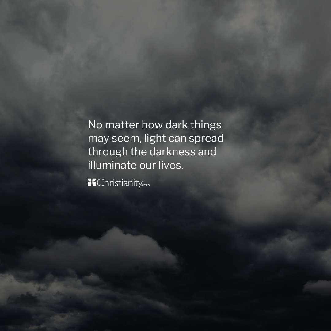 Dark storm clouds with Christian quote about light overcoming darkness and bringing hope