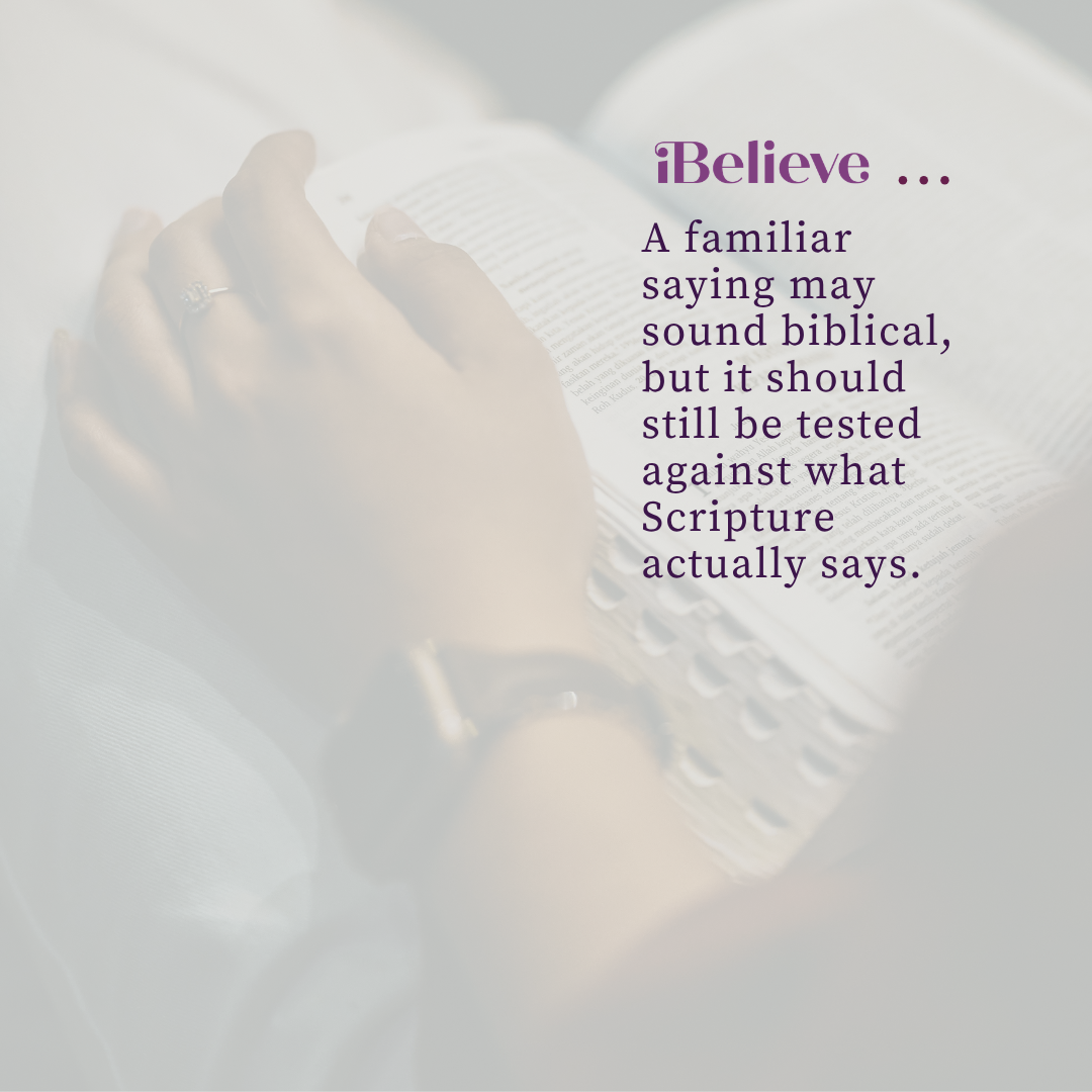 Open Bible with hands resting on the pages beside a reminder to test familiar sayings against what Scripture actually says.