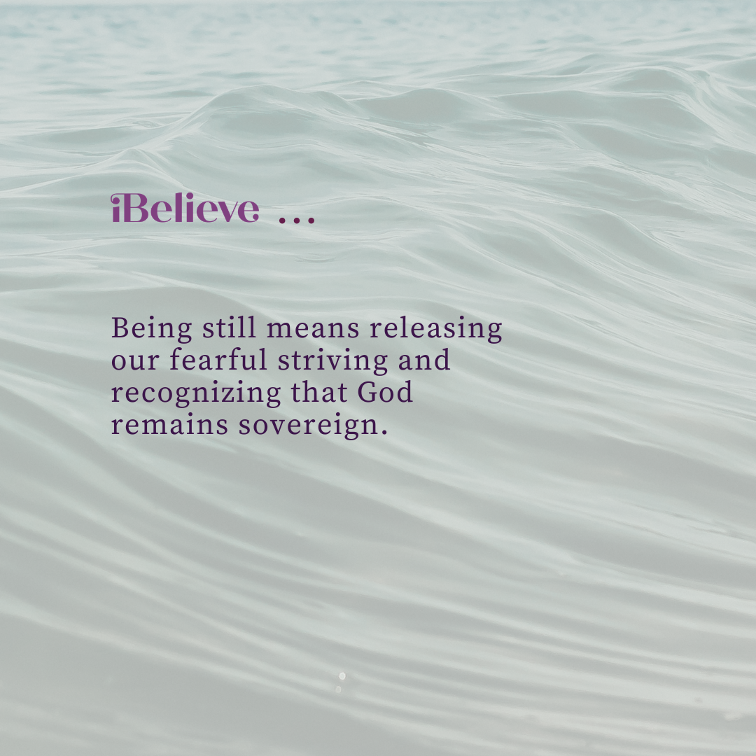 iBelieve quote graphic over peaceful ocean waves reading, “Being still means releasing our fearful striving and recognizing that God remains sovereign.”